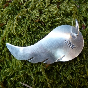 Wing pendant